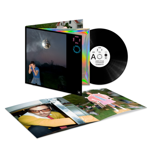 Opened Harry Styles Kiss All The Time Disco Occasionally Black Vinyl set displaying black record LP, album artwork, holographic sleeve and collectible inserts booklet pages
