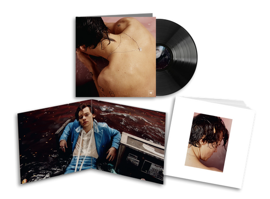 Harry Styles vinyl set with black record, open photo booklet and portrait insert, premium Harry Styles merchandise