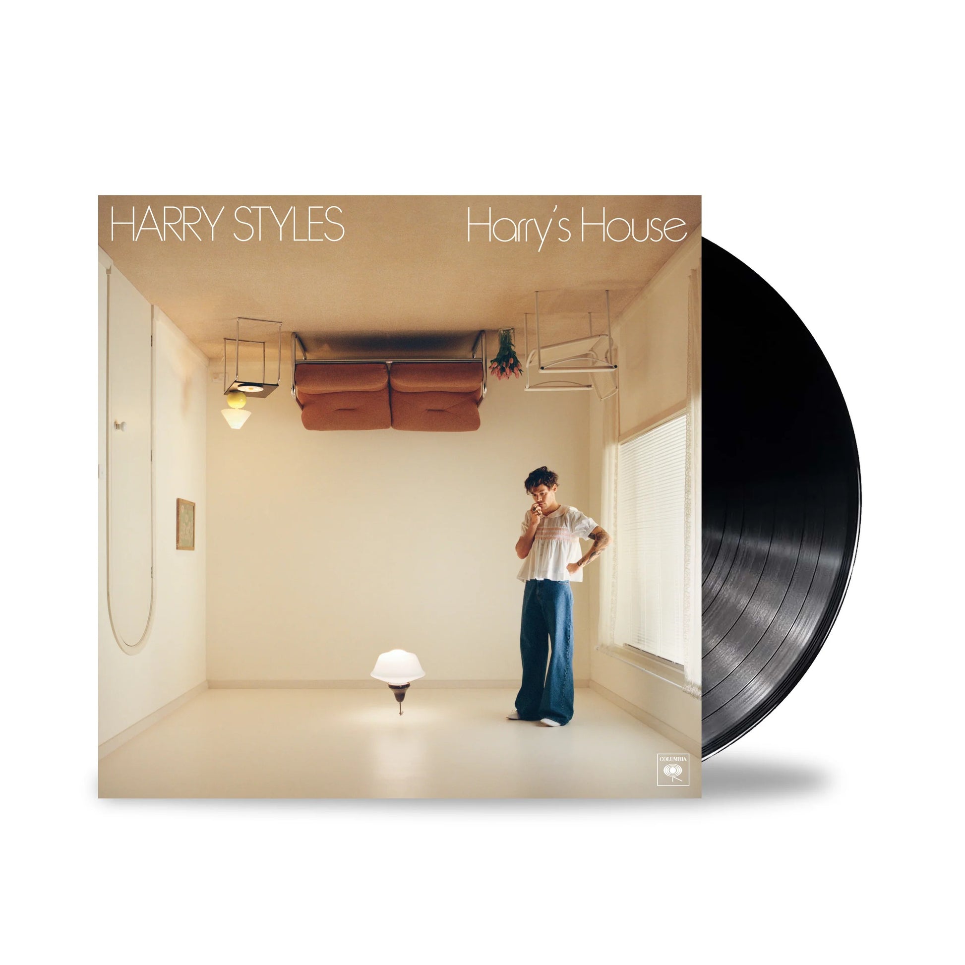 Harry's House black vinyl record from Harry Styles official merch featuring album cover artwork and premium LP collectible edition