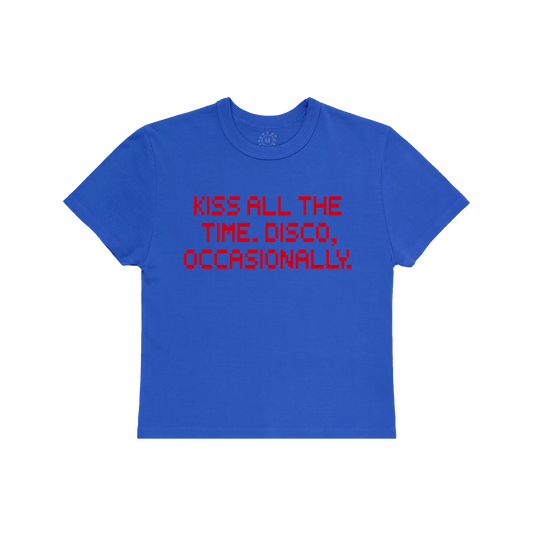 Front view of blue Harry Styles KATTDO Cover Baby Tee featuring Kiss All The Time Disco Occasionally album-inspired pixel text graphic on soft fitted cotton fabric